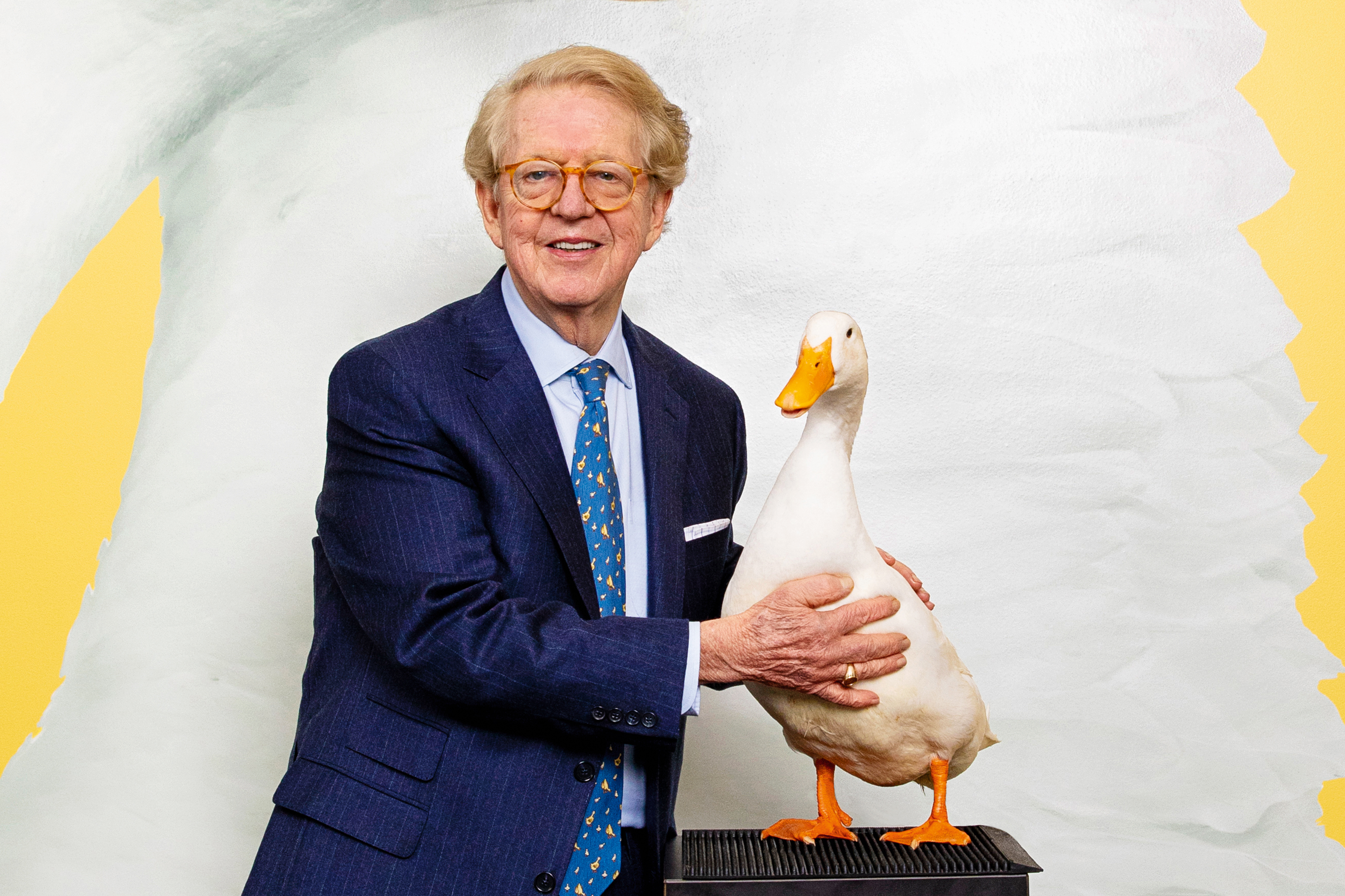 AFLAC CEO and Chairman Dan Amos at the AFLAC headquarters with a duck in Columbus, Georgia on February 16, 2024.
