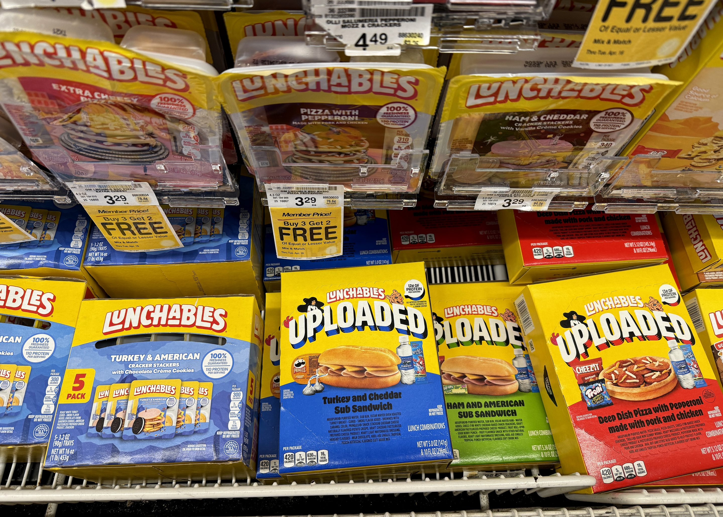 Lunchables are displayed on a shelf