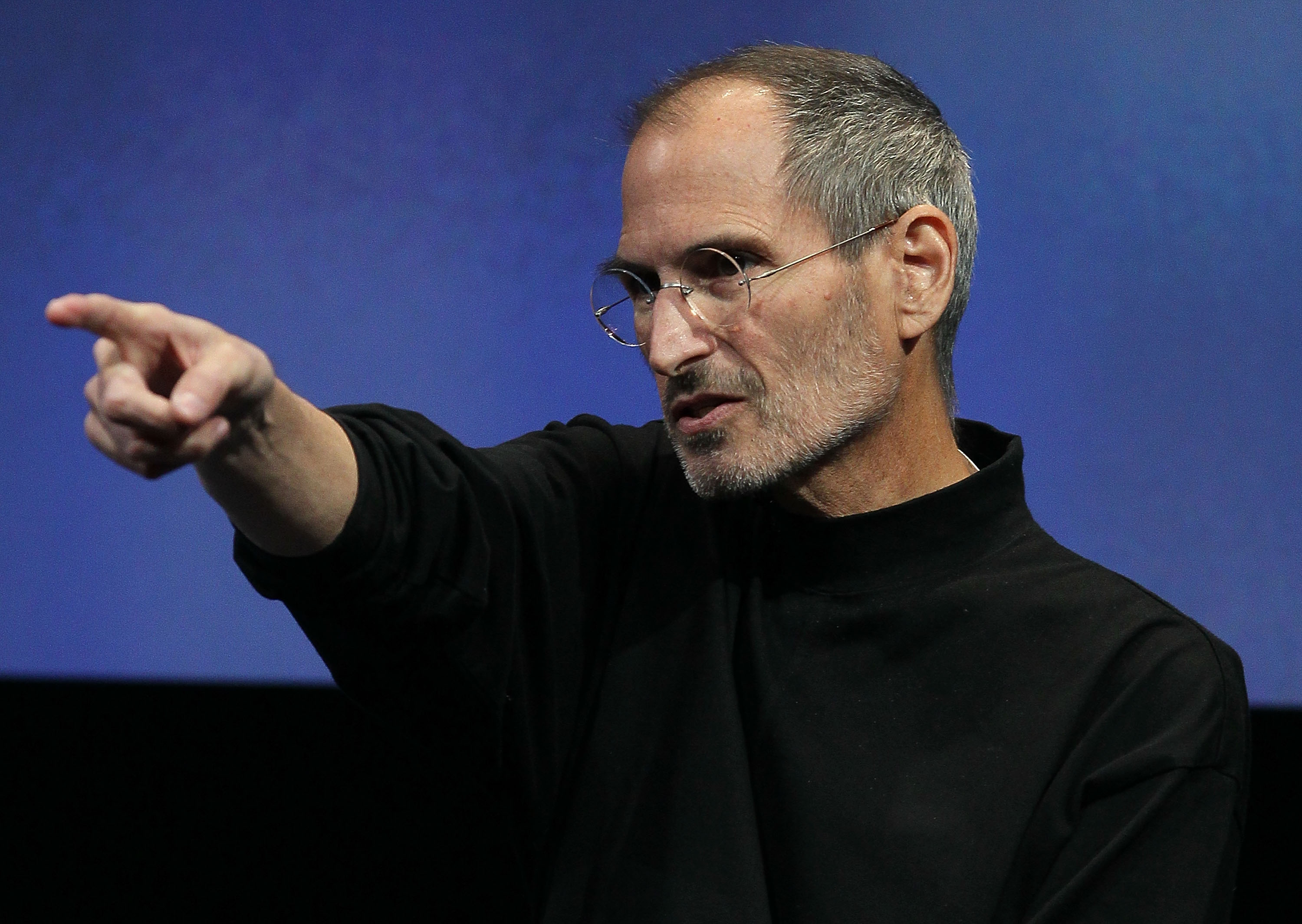 Steve Jobs points during an Apple event
